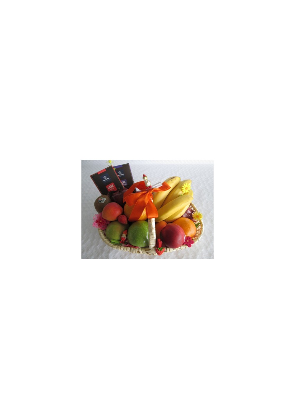 Geschenkmand met chocolade en fruit