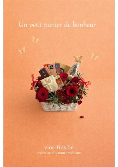 bloemenmand-leonidas-alcoholvrij-NL.jpg | Luxe bloemen geschenkmand met rode bloemen en Léonidas pralines