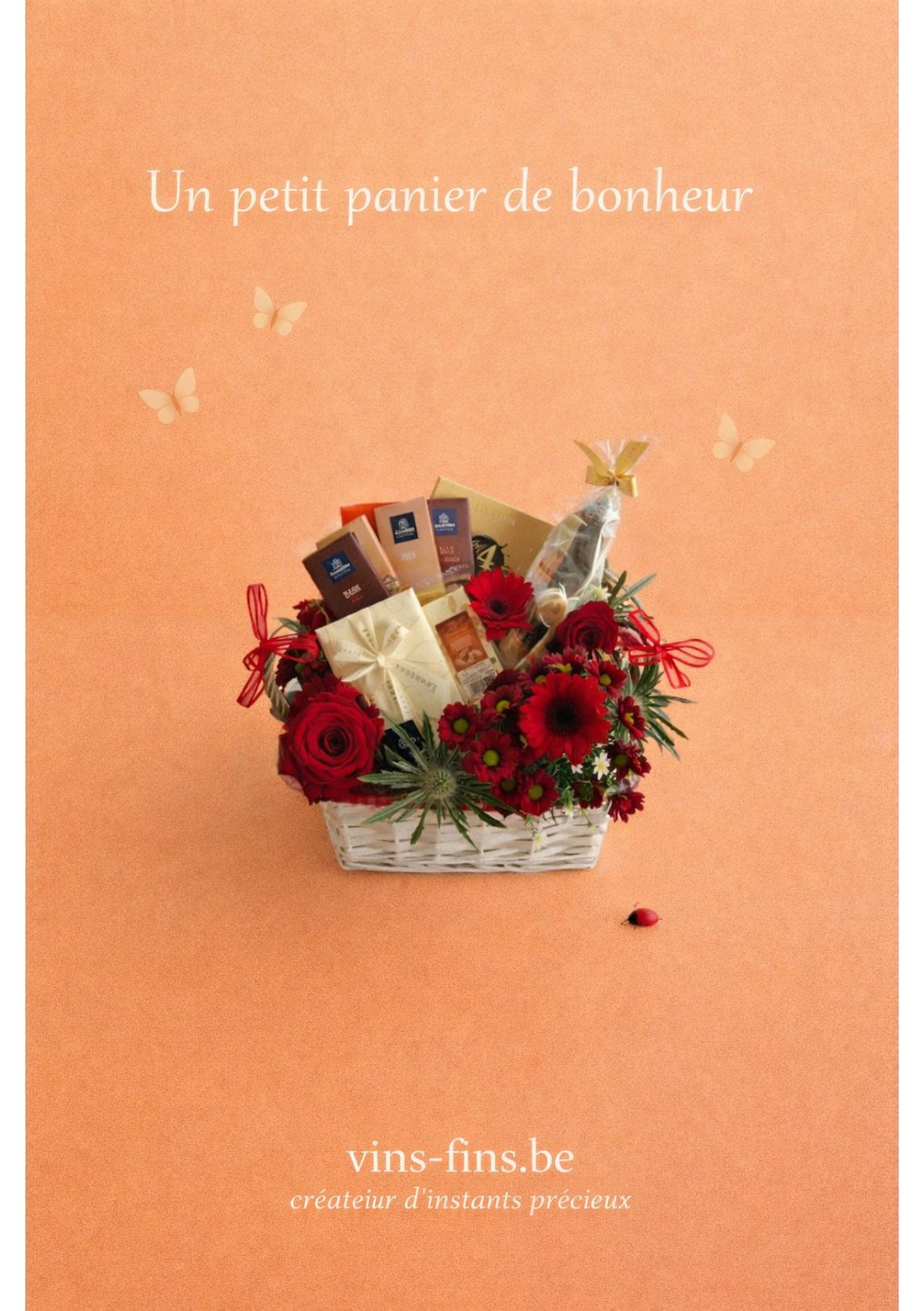 bloemenmand-leonidas-alcoholvrij-NL.jpg | Luxe bloemen geschenkmand met rode bloemen en Léonidas pralines
